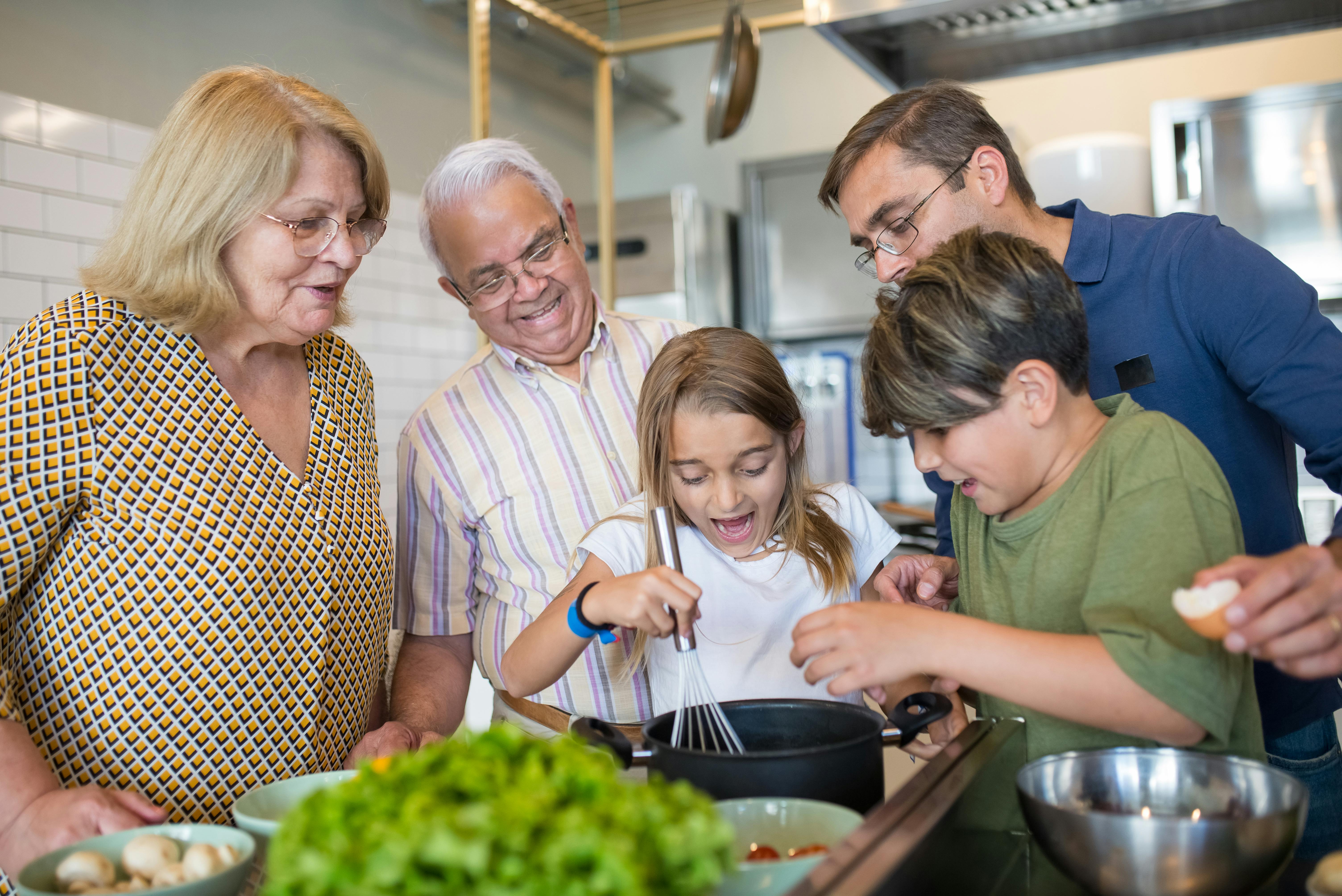 Multi-generational Latino family protected by insurance